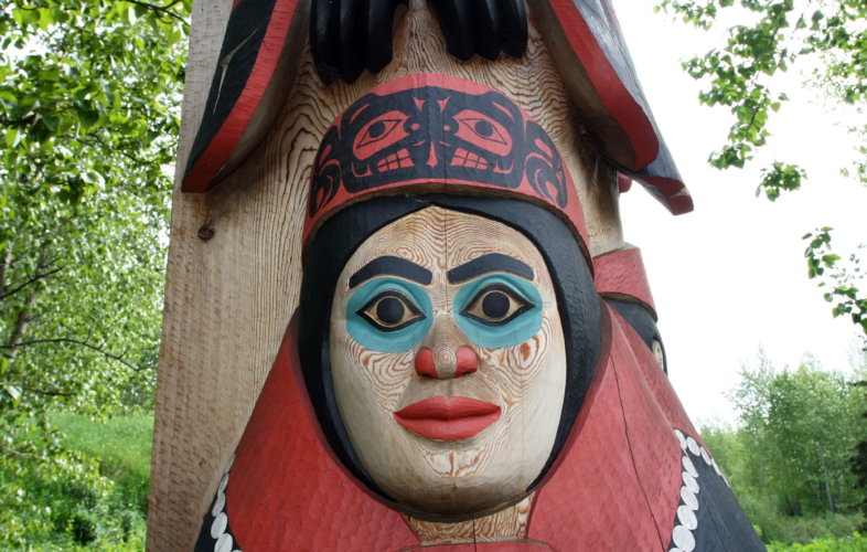 Face carved on totem pole