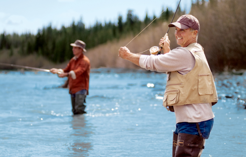 Two men in waders fishing on the Copper River